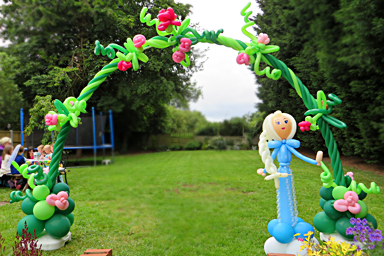 Balloony rose arch with Elsa character greeter