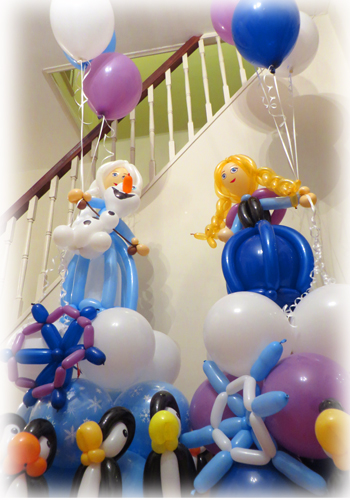 Elsa/Anna sculptures with 3 balloon bouquets £30